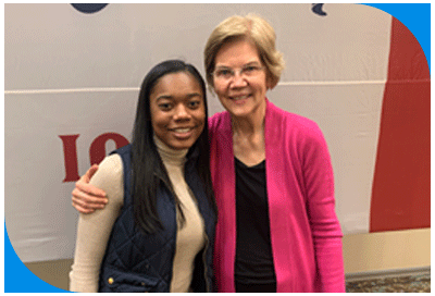 Ny'Asia stands with Senator Elizabeth Warren in Iowa